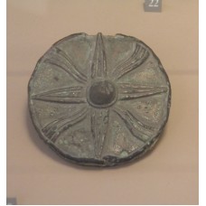 Medallion decorated with bronze star, Susa cross, sun rays